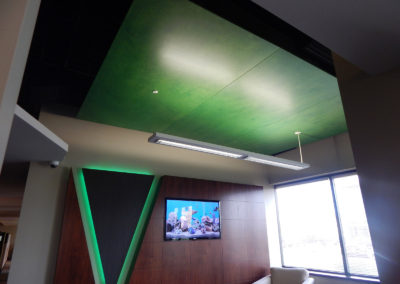 commercial office construction with green lighting